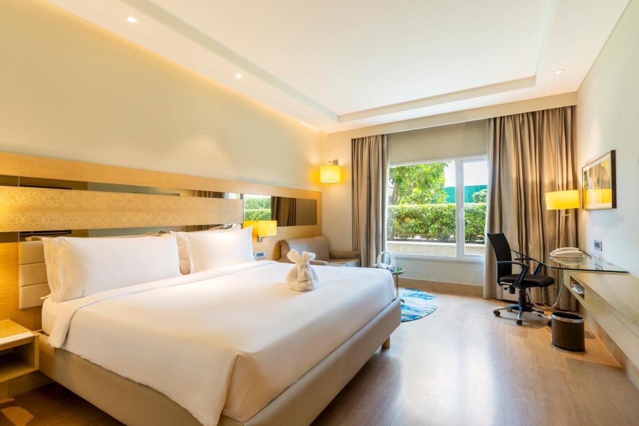 Holiday Inn Agra MG Road an IHG Hotel Bagian luar foto Deluxe Room