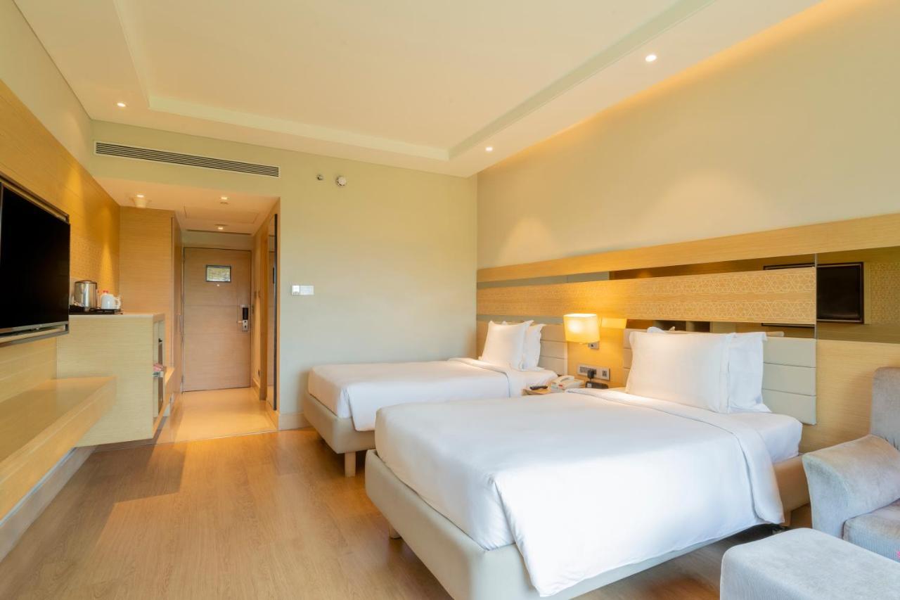 Holiday Inn Agra MG Road an IHG Hotel Bagian luar foto Deluxe Room