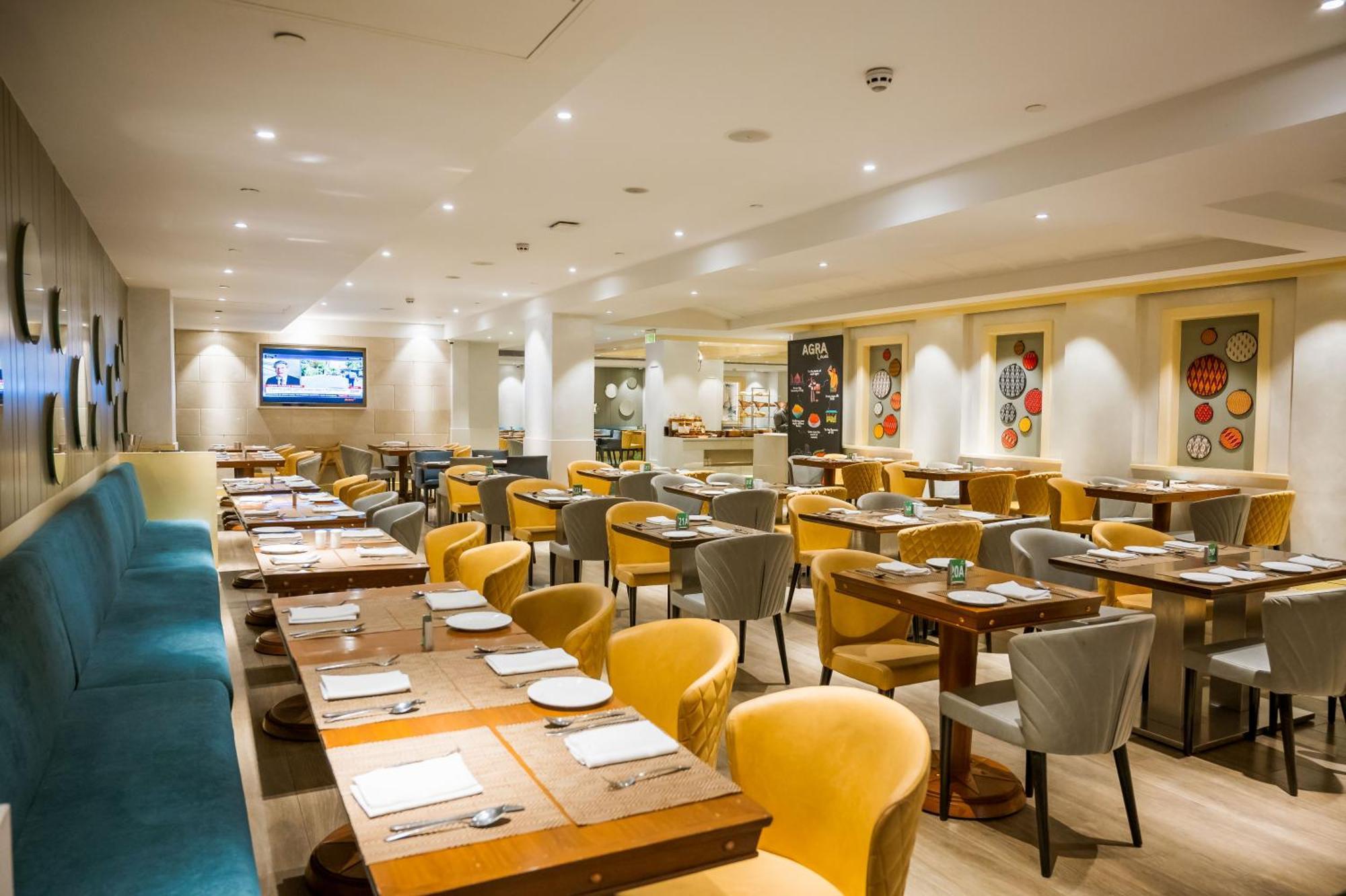 Holiday Inn Agra MG Road an IHG Hotel Bagian luar foto The restaurant